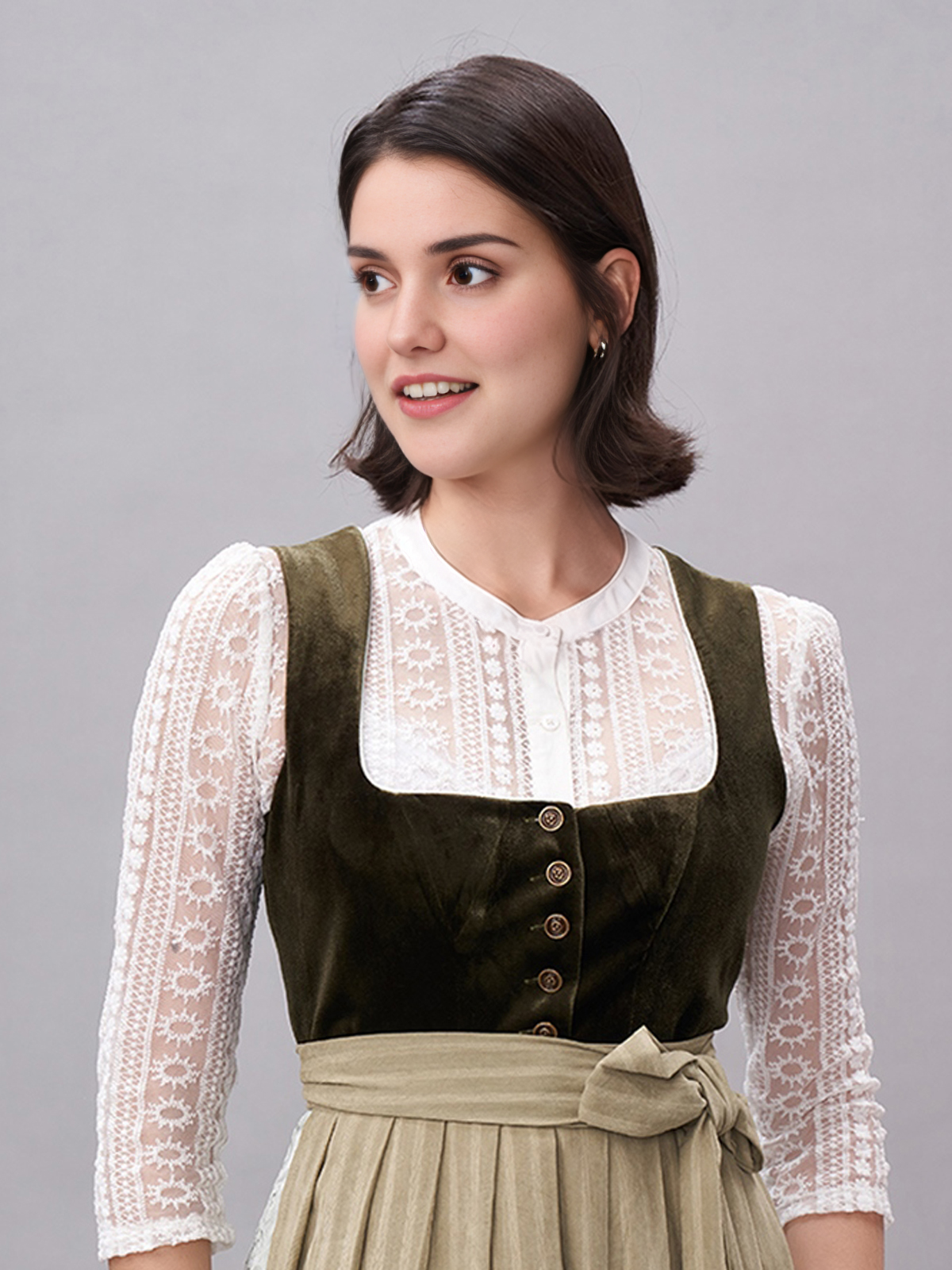 Dirndl in Grün mit floralen Details