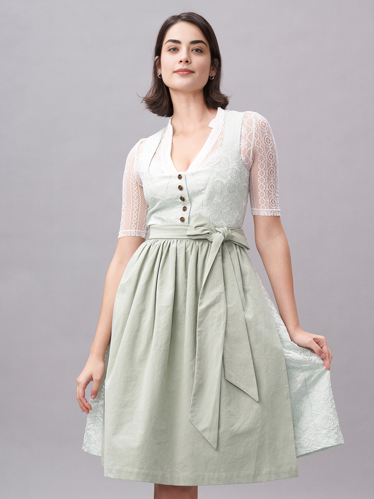 Elegantes grünes Dirndl mit schlichter Schnürung